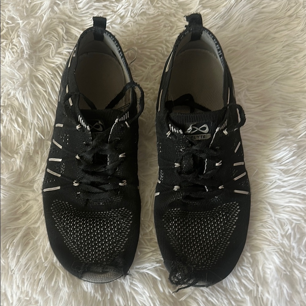 NFINITY Black VERY USED WITH HOLES cheer shoes